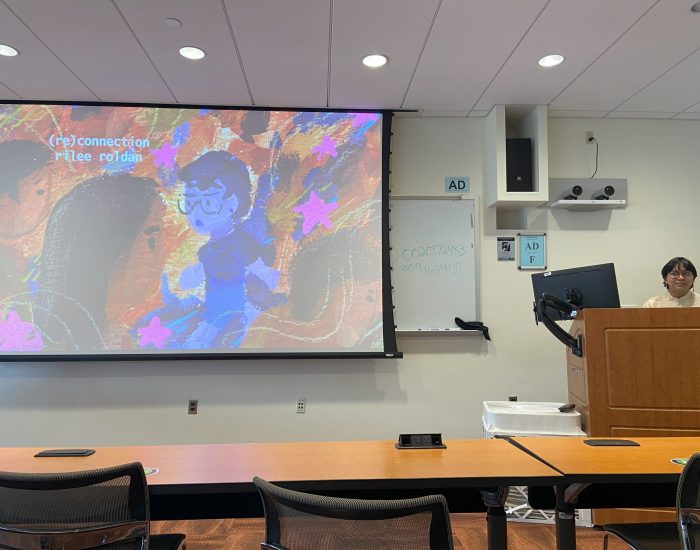 Rilee Roldan, a UConn student, presents their project, “(Re)Connection,” on the Asian American Art and Storytelling panel.