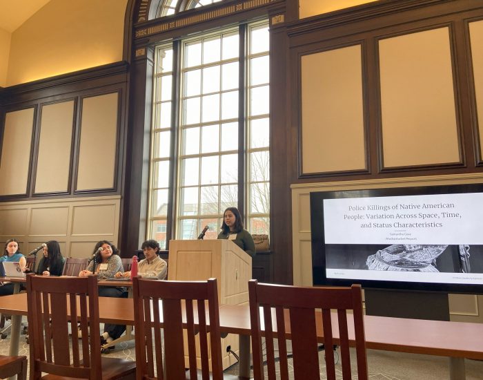 Samantha Gove, a UConn student, presents her project, “Police Killings of Native American People: Examining Variation across Space, Time, and Status Characteristics,” at the Community Mobilization and Resistance to Police Violence panel.