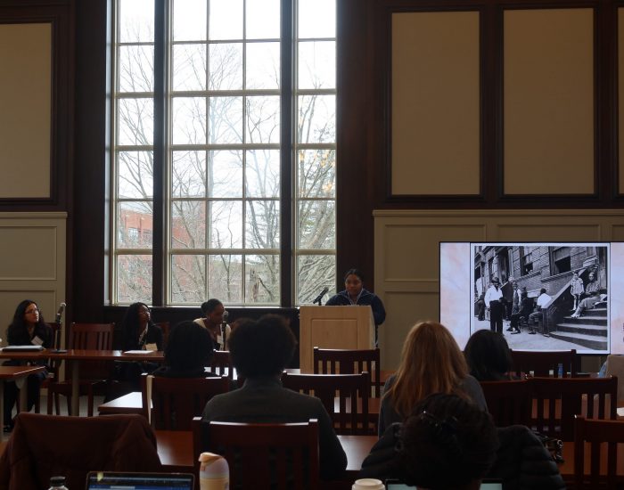 Serena Prince, a Connecticut College student, presents her project, “When Freedom is Forgotten: An Examination of New York’s Freedom Day 1964,” on the Black Women’s Visibility and Educational Justice panel. (Photo by Katherine Jimenez)