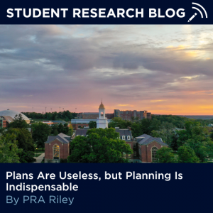 Picture of the UConn Storrs campus from a distance with text "Student Research Blog, Plans Are Useless, but Planning Is Indispensable, By PRA Riley."