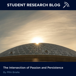 An image of Gampel Pavillion covered in snow with the words "Student Research Blog" at the top, and "The Intersection of Passion and Persistence by PRA Brielle" at the bottom.